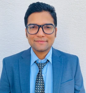 Dr. Rajindera Khanal